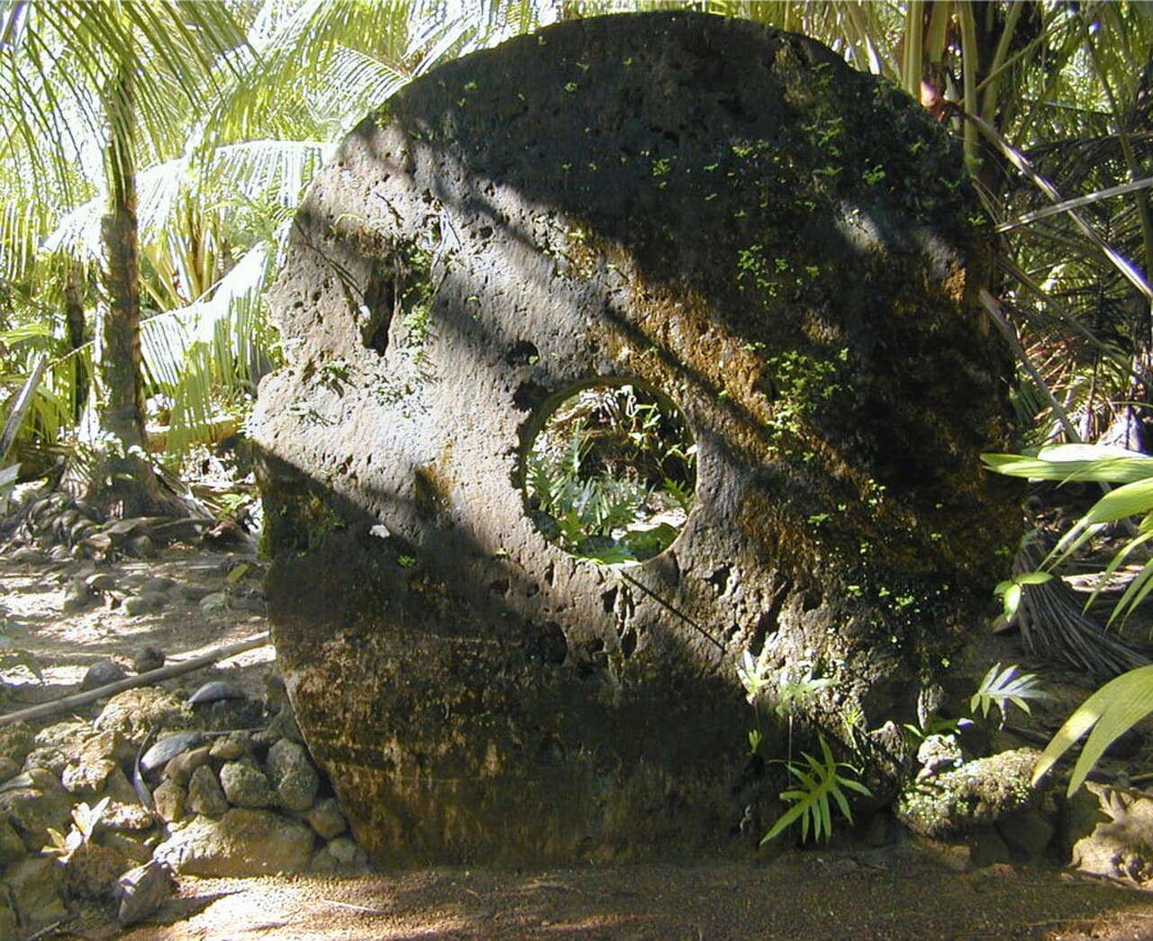 Yapese rai stones. Ownership — not physical possession — was what made them money. A famous Yapese rai still sits on the Pacific seabed where it was lost in transit, and continues to change hands.