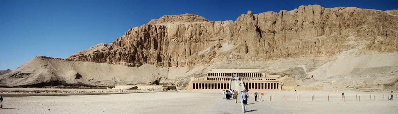 The mortuary temple of Hatshepsut at Deir el-Bahari, near Thebes. Three terraces of colonnades against the cliffs of the Theban necropolis.