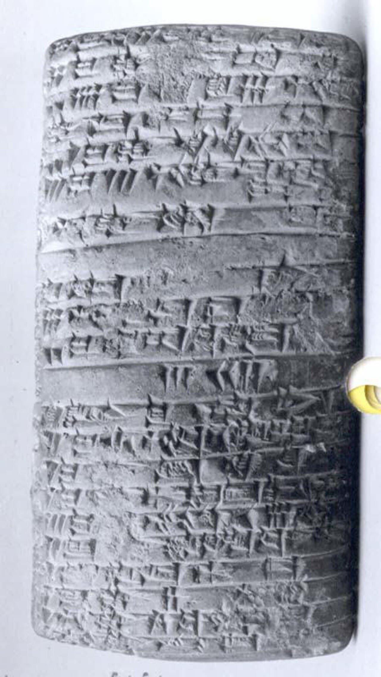 A Sumerian accounting tablet. The earliest writing in history was developed for bookkeeping; debts and obligations predate coins by thousands of years.