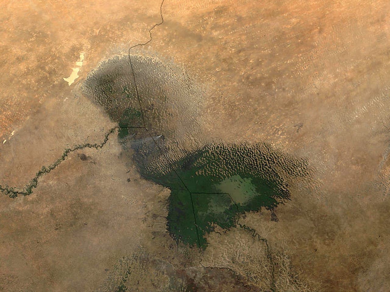 The Bodélé Depression, dry bed of what was once Lake Mega-Chad. At maximum extent (around 6000 BCE) the lake covered roughly 350,000 square kilometres.